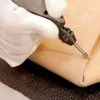 High Speed Router - 6.4 mm - Dremel's largest head with triangular shape, shaping and creating V-shaped grooves e.g. wood